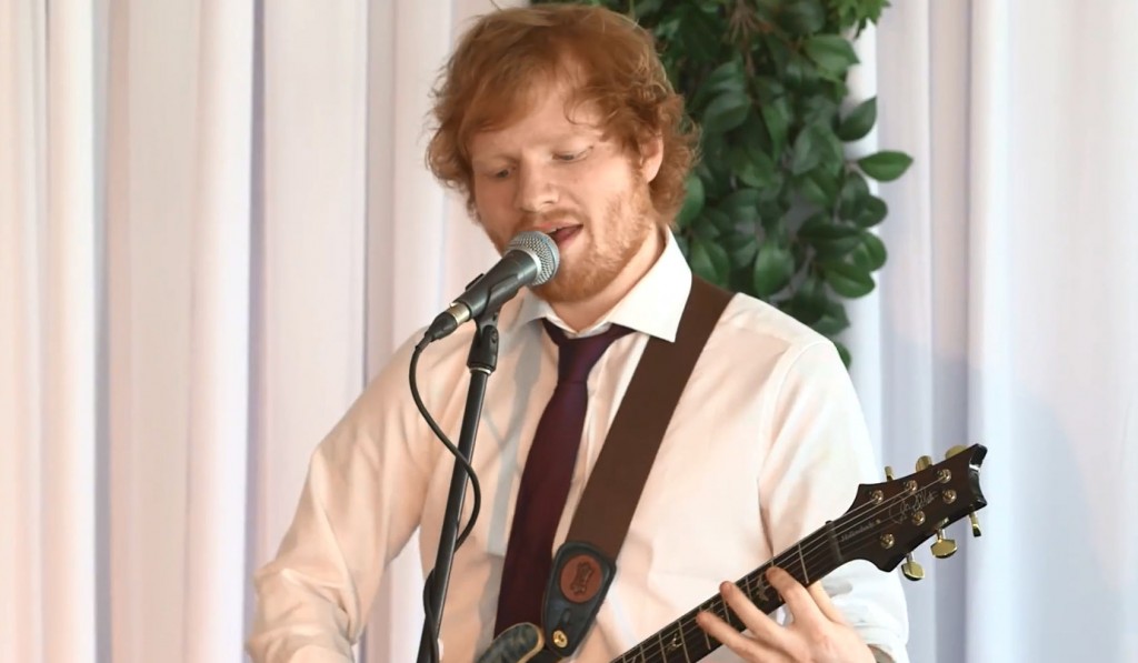 Ed Sheeran sings to newlywed couple